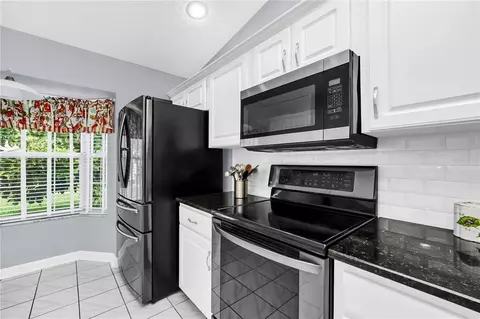 Kitchen - 909 Illinois Ave, Saint Cloud, FL 34769 photo 2 of 5