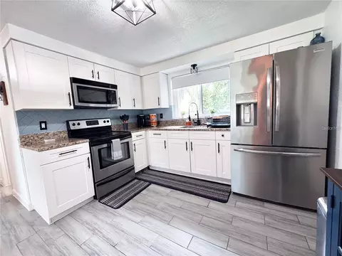 Kitchen - 9616 Pine Ridge Ave, Riverview, FL 33578 photo 2 of 3