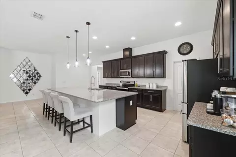Kitchen - 4791 Riverwalk Dr, Saint Cloud, FL 34771 photo 2 of 2