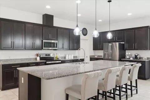 Kitchen - 4791 Riverwalk Dr, Saint Cloud, FL 34771 photo 1 of 2