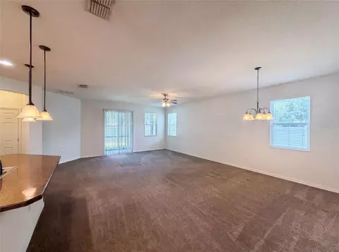 Living - 4311 Moon Shadow Loop, Mulberry, FL 33860 photo 1 of 3