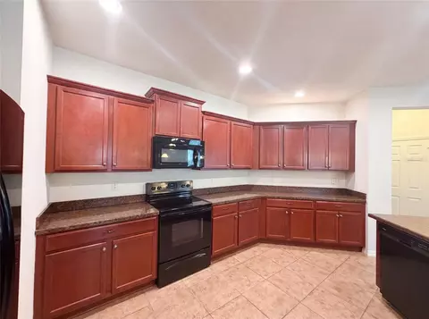 Kitchen - 4311 Moon Shadow Loop, Mulberry, FL 33860 photo 2 of 2