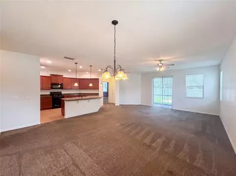 Living - 4311 Moon Shadow Loop, Mulberry, FL 33860 photo 2 of 3