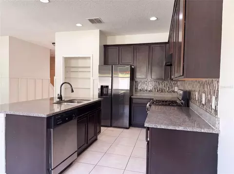 Kitchen - 881 Haring Ln, Mount Dora, FL 32757 photo 3 of 4
