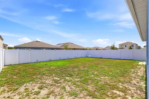 Exterior - 2561 Harmonia Hammock Rd, Harmony, FL 34773 photo 8 of 14