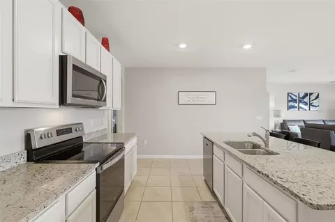 Kitchen - 2561 Harmonia Hammock Rd, Harmony, FL 34773 photo 3 of 4