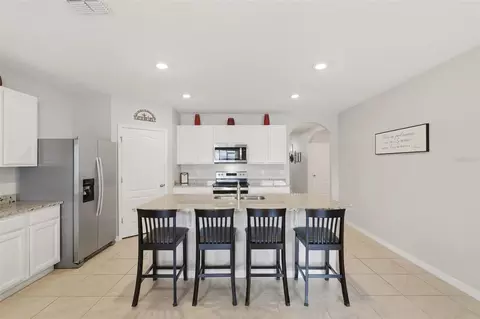 Kitchen - 2561 Harmonia Hammock Rd, Harmony, FL 34773 photo 2 of 4