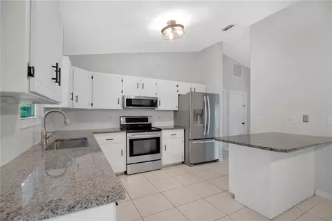 Kitchen - 2519 Unity Tree Dr, Edgewater, FL 32141 photo 3 of 4
