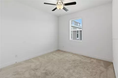 Bedroom - 3393 Wauseon Dr, Saint Cloud, FL 34772 photo 4 of 12