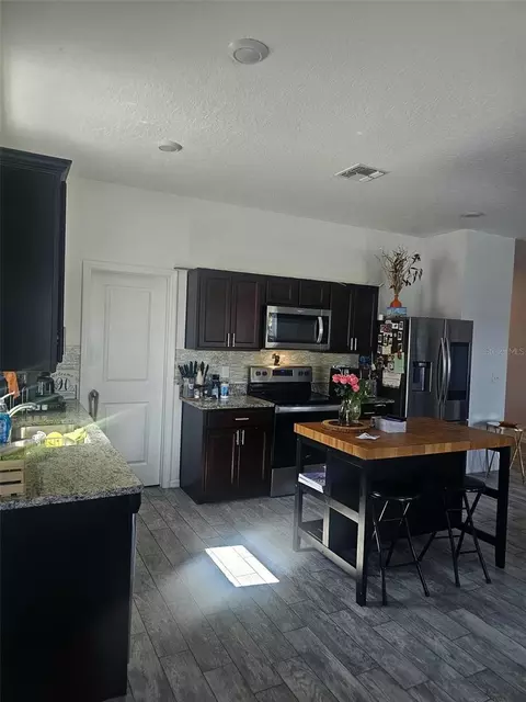 Kitchen - 5841 Bullock Pl, Saint Cloud, FL 34771 photo 2 of 3