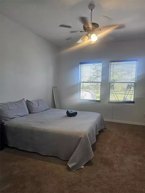 Bedroom - 5841 Bullock Pl, Saint Cloud, FL 34771 photo 4 of 4