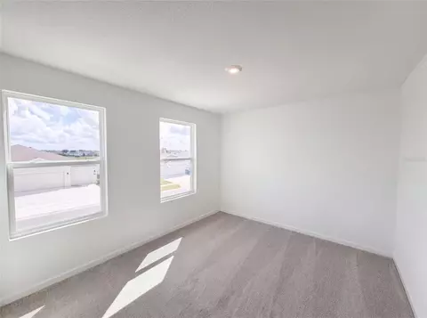 Bedroom - 2142 Lasso Loop, Eagle Lake, FL 33839 photo 6 of 7