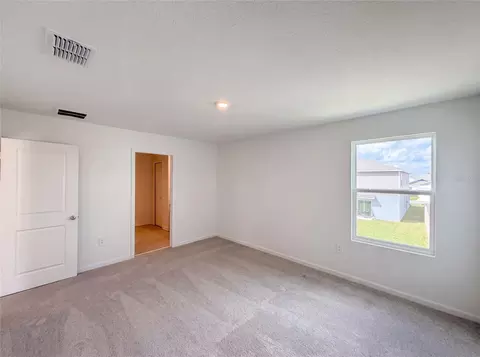 Bedroom - 2142 Lasso Loop, Eagle Lake, FL 33839 photo 3 of 7