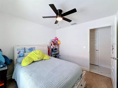 Bedroom - 5108 SW 90th Pl, Ocala, FL 34476 photo 3 of 11