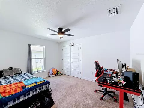 Bedroom - 5108 SW 90th Pl, Ocala, FL 34476 photo 1 of 11
