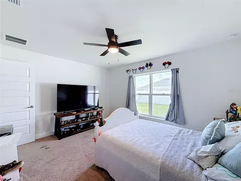 Bedroom - 5108 SW 90th Pl, Ocala, FL 34476 photo 8 of 11