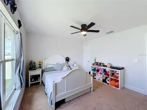 Bedroom - 5108 SW 90th Pl, Ocala, FL 34476 photo 6 of 11