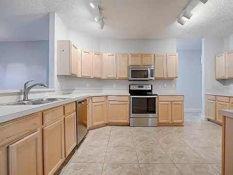 Kitchen - 1306 Rain Forest Ln, Minneola, FL 34715 photo 3 of 3