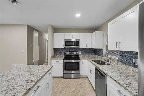 Kitchen - 1339 E Jackson Ave, Mount Dora, FL 32757 photo 2 of 3