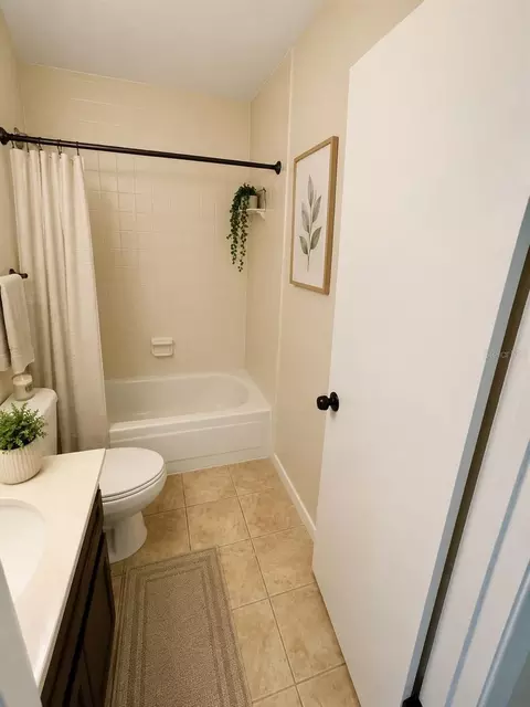 Bath - 6057 Windhover Dr #E-08, Orlando, FL 32819 photo 1 of 2