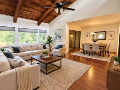 Living - 6057 Windhover Dr #E-08, Orlando, FL 32819 photo 1 of 4