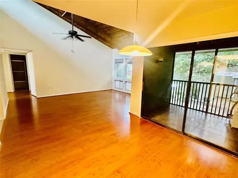 Living - 6057 Windhover Dr #E-08, Orlando, FL 32819 photo 4 of 4