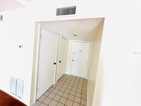 Entry Way - 6057 Windhover Dr #E-08, Orlando, FL 32819 photo 2 of 2
