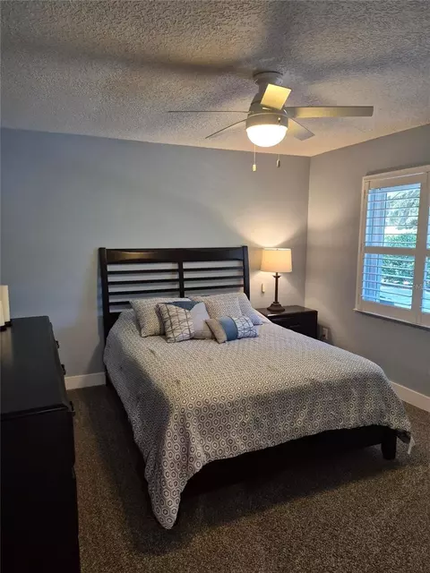 Bedroom - 5370 Whispering Pine Cir, Saint Cloud, FL 34771 photo 4 of 5