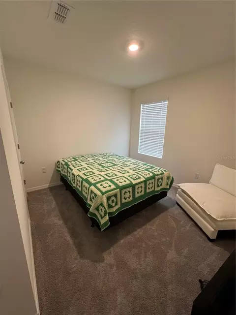 Bedroom - 4032 Grey Heron Loop, Bartow, FL 33830 photo 2 of 4