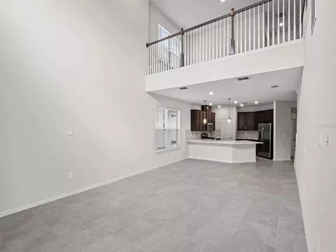 Living - 2865 High Pointe St, Clermont, FL 34711 photo 7 of 8