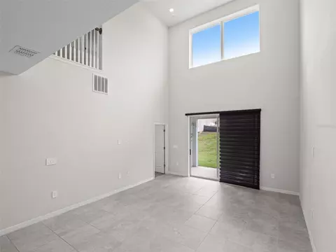 Living - 2865 High Pointe St, Clermont, FL 34711 photo 5 of 8