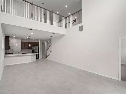 Living - 2865 High Pointe St, Clermont, FL 34711 photo 4 of 8