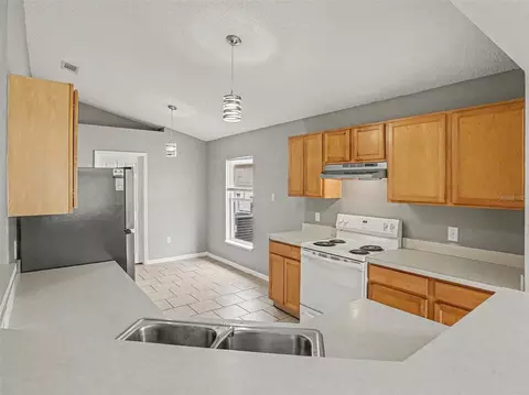 Kitchen - 881 Vanderbilt Dr, Eustis, FL 32726 photo 2 of 3