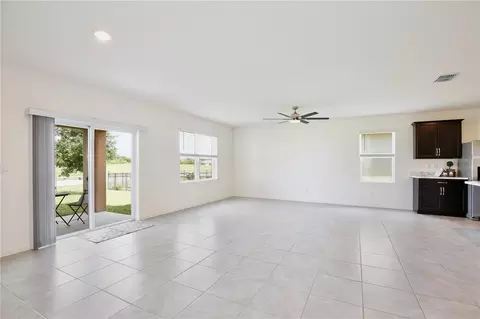 Living - 3020 Burrowing Owl Dr, Mims, FL 32754 photo 2 of 4
