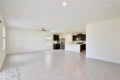Living - 3020 Burrowing Owl Dr, Mims, FL 32754 photo 3 of 4