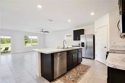 Kitchen - 3020 Burrowing Owl Dr, Mims, FL 32754 photo 1 of 4