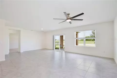 Living - 3020 Burrowing Owl Dr, Mims, FL 32754 photo 1 of 4