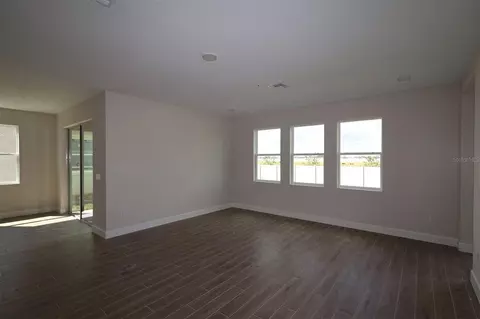 Living - 5400 Lassen St, Saint Cloud, FL 34771 photo 3 of 5