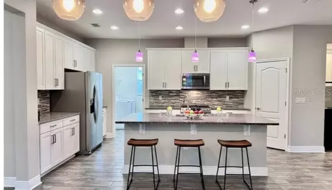 Kitchen - 1557 Amber Leaf Cir, Ocoee, FL 34761 photo 3 of 9