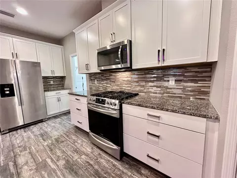 Kitchen - 1557 Amber Leaf Cir, Ocoee, FL 34761 photo 7 of 9