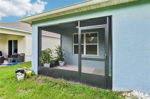 Exterior - 2532 Harmonia Hammock Rd, Saint Cloud, FL 34773 photo 4 of 9