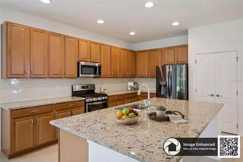 Kitchen - 211 Lugano Way, Debary, FL 32713 photo 3 of 4