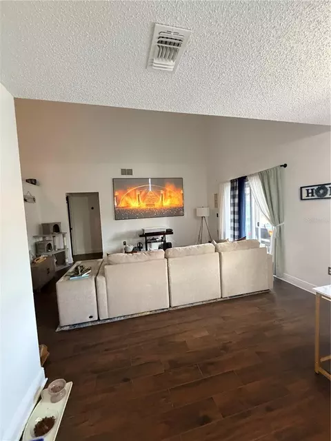 Living - 401 Chancellor Ct, Saint Cloud, FL 34769 photo 2 of 3