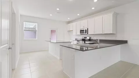 Kitchen - 5571 Ronin Dr, Saint Cloud, FL 34771 photo 1 of 2