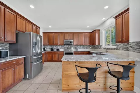 77 Rollins Ln, Palm Coast, FL 32164