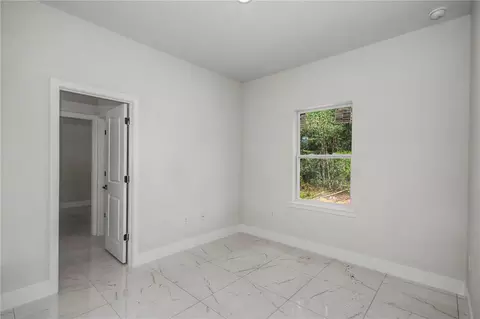 Bedroom - 7845 SW 127th Loop, Ocala, FL 34473 photo 6 of 9