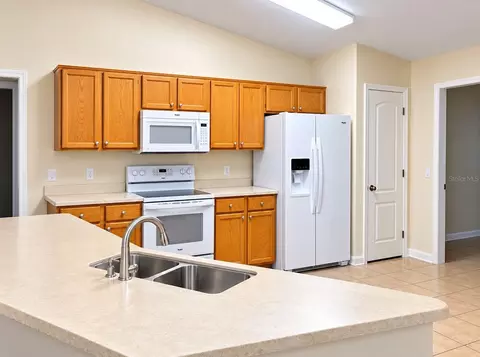 Kitchen - 24107 Milford Dr, Eustis, FL 32736 photo 1 of 3