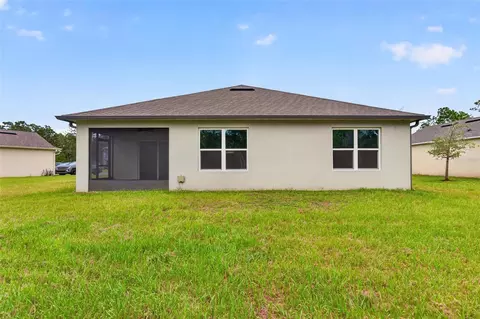 Exterior - 50 Caballero Ct, Ormond Beach, FL 32174 photo 7 of 11