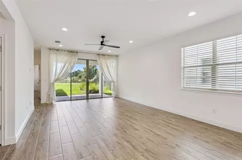 Living - 3200 Oxbow Ct, Harmony, FL 34773 photo 2 of 6