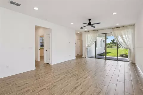Living - 3200 Oxbow Ct, Harmony, FL 34773 photo 3 of 6